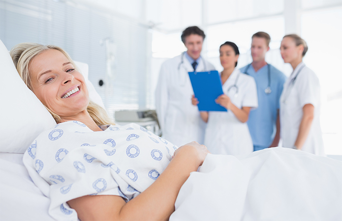 Happy Patient receiving good care, empathy and communications with staff